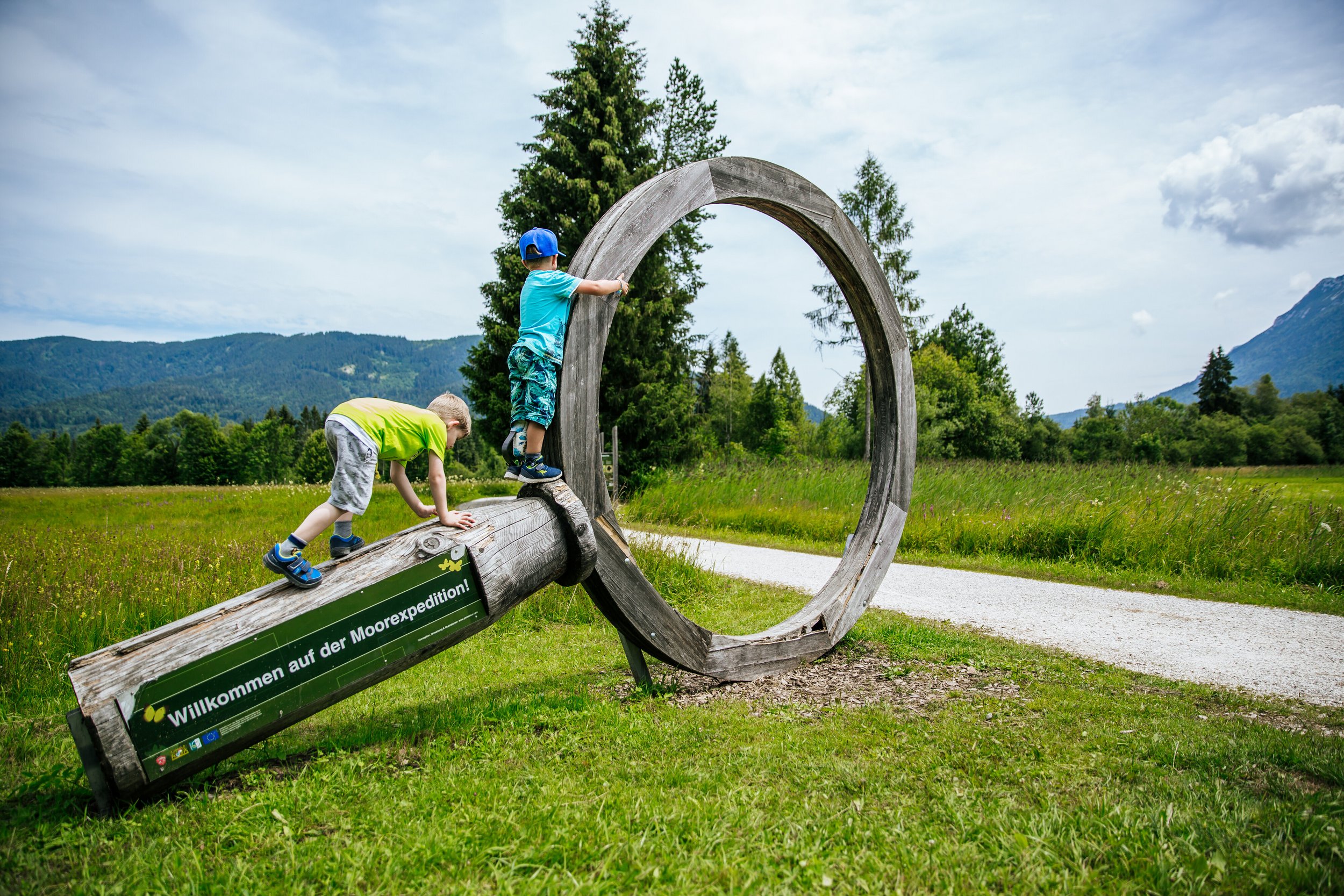 Children romp on the moor adventure trail in Inzell