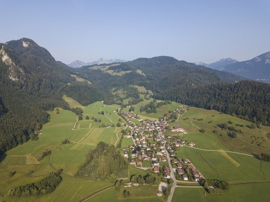 Municipality of Oberwössen and Unterwössen from above with a view of the Bavarian Alps