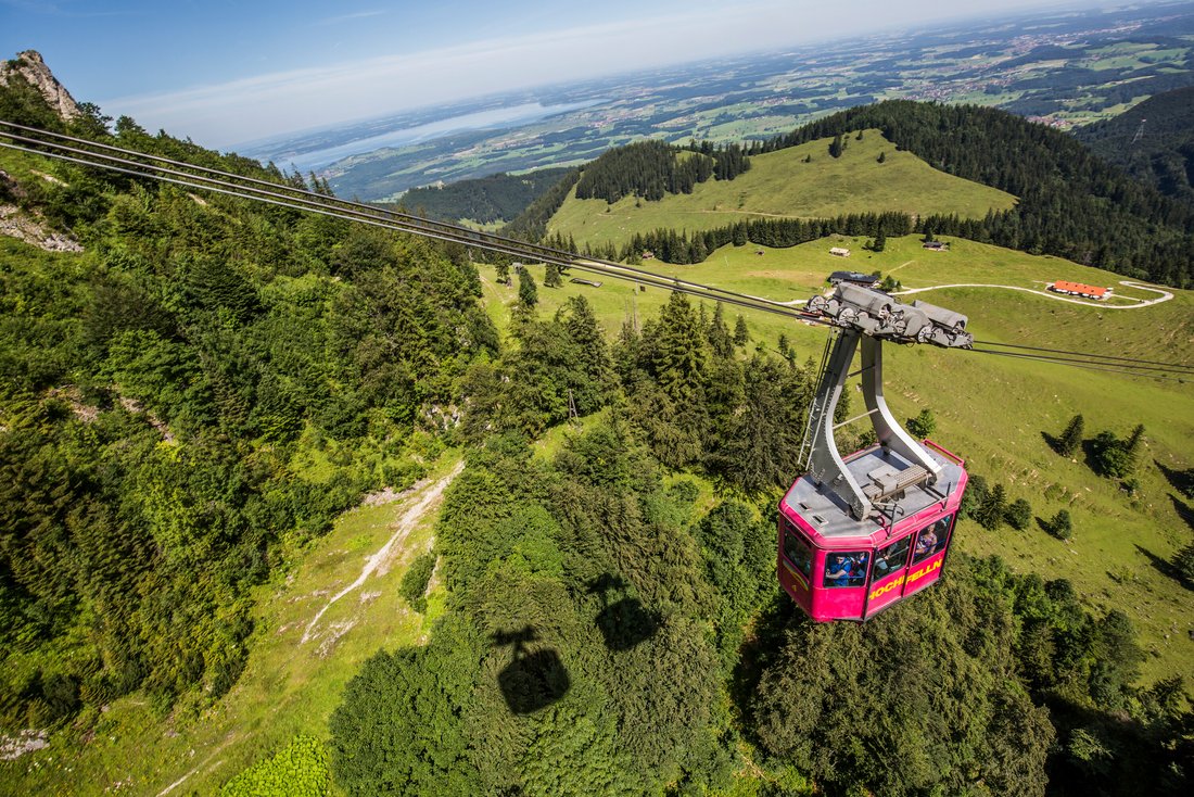 Lift of the Hochfellnseilbahn in Bergen with the Chiemsee in the background