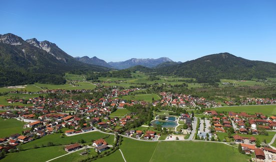 Aerial photo of the municipality of Inzel with a view of the foothills of the Alps