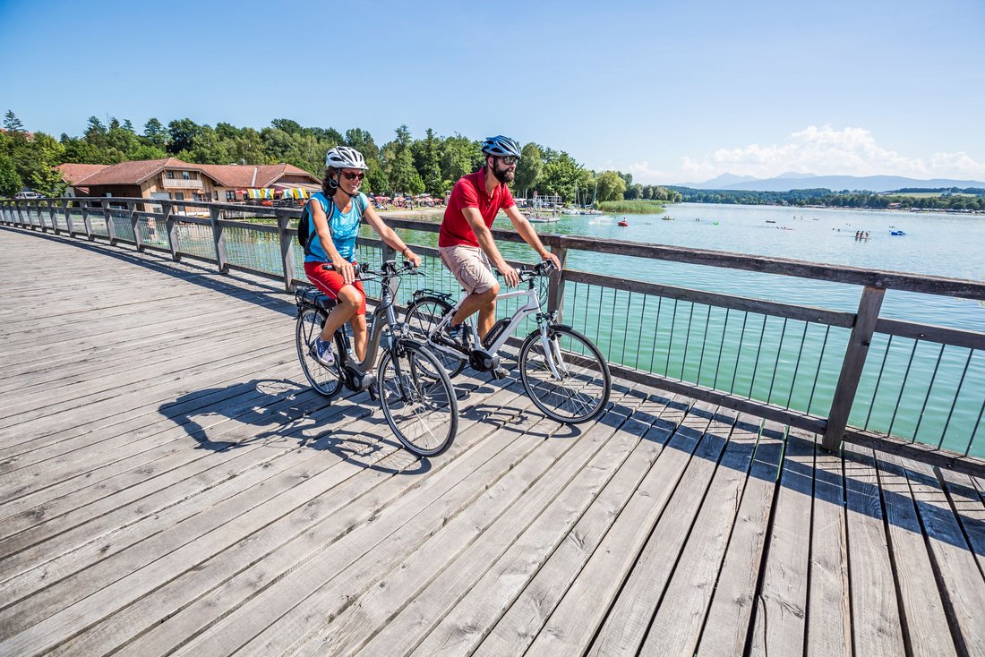 Cyclists on the pier at Waginger See