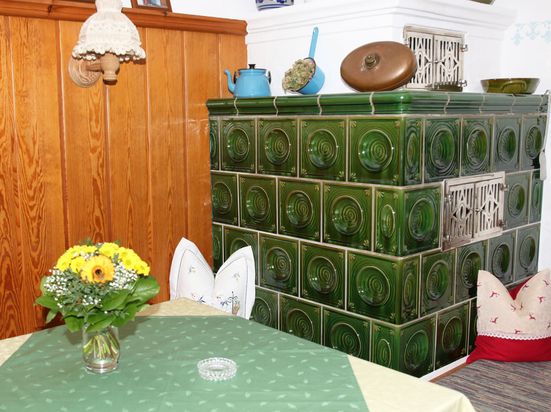 Lounge with tiled stove