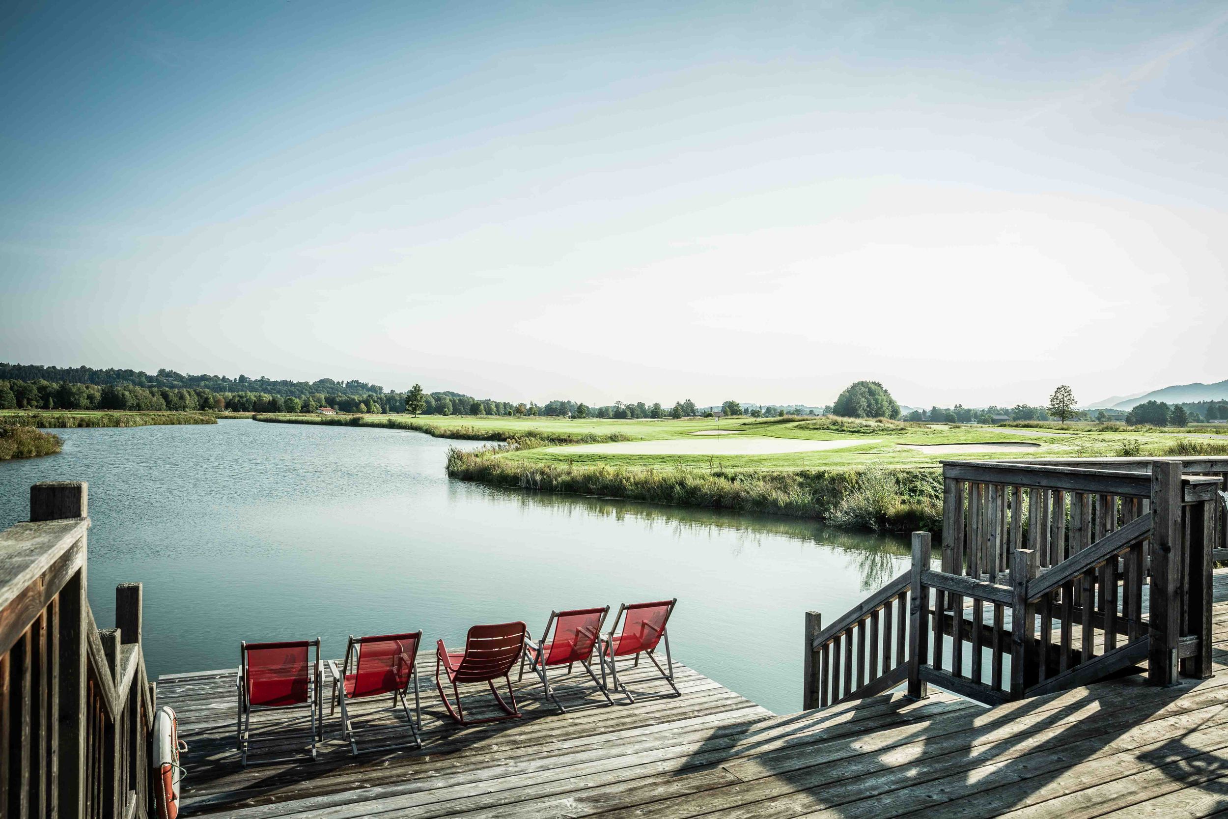 View of the water hole in the Achental golf resort in Grassau