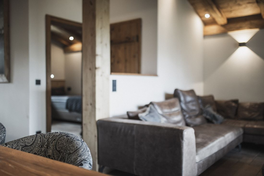 Chalet BERGSUCHT- gemütliches Wohnzimmer mit Holzkamin